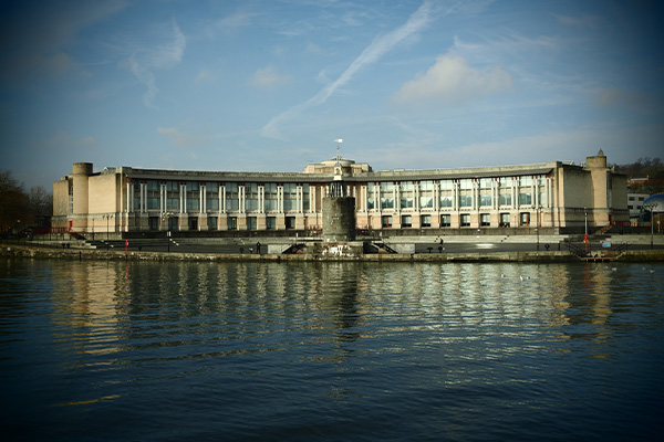 Building in front of water